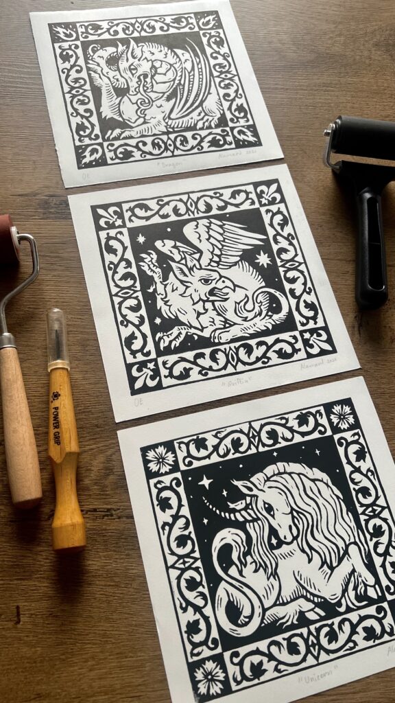 Medieval heraldic fantasy linocut prints of a dragon, griffin and a unicorn