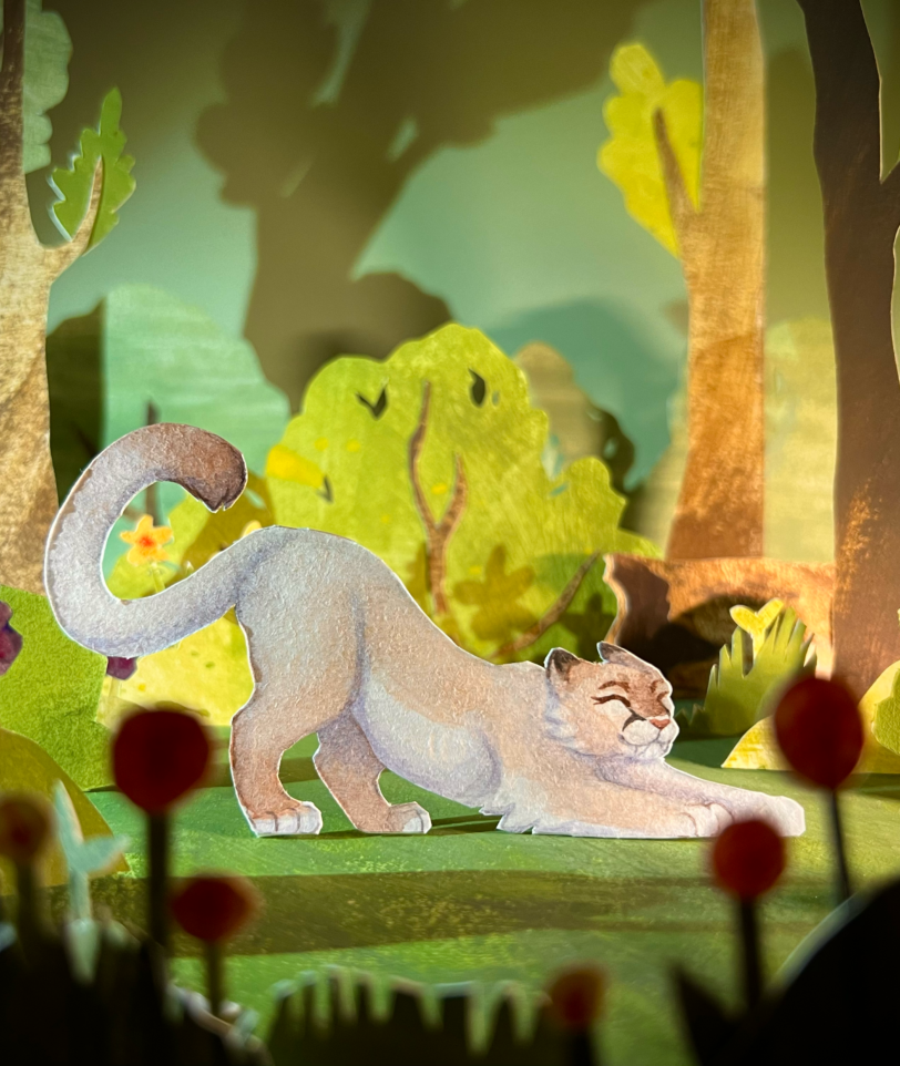 Paper craft diorama of puma in the forest