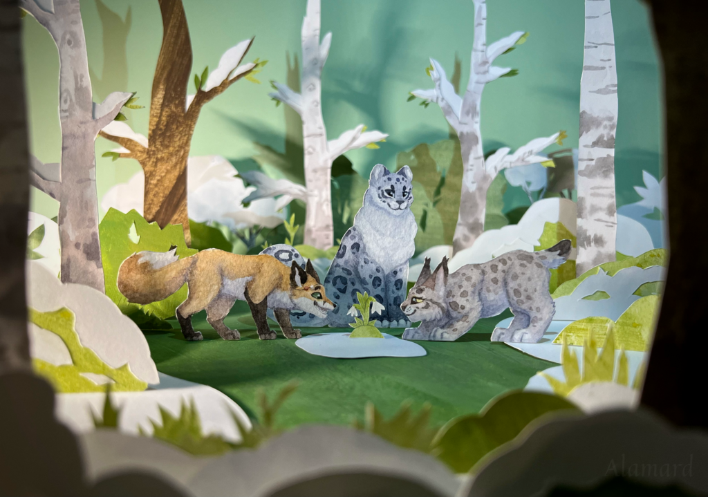 Paper craft diorama of a fox, snow leopard and a lynx in the spring forest