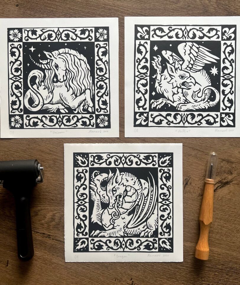 Medieval heraldic fantasy linocut prints of a dragon, griffin and a unicorn